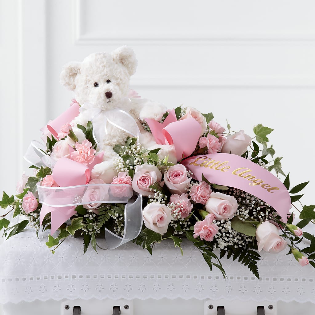 Touch of Sympathy Casket Spray – Rainbow Flower Shop, Huron SD