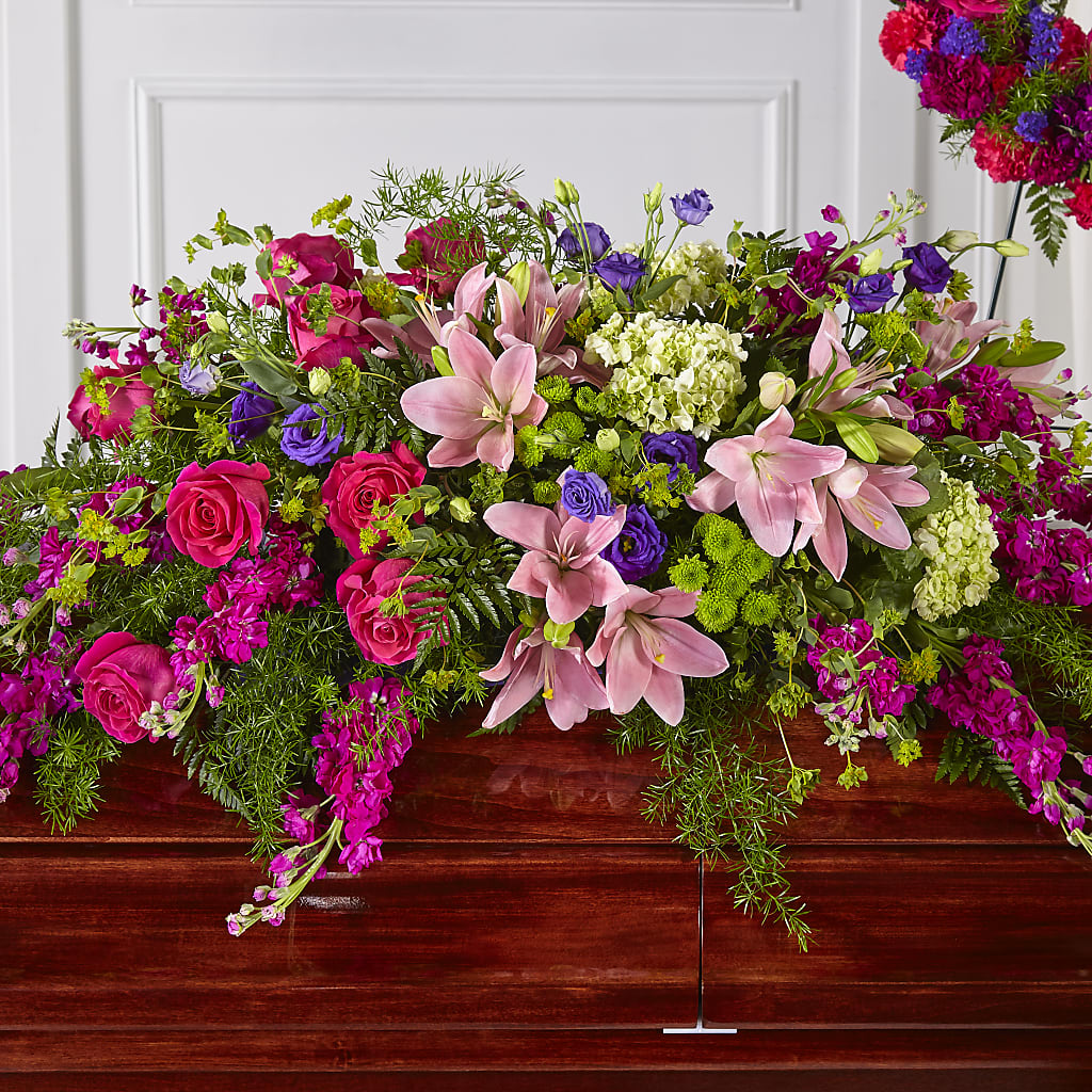 Radiant Tribute Casket Spray – Rainbow Flower Shop, Huron SD