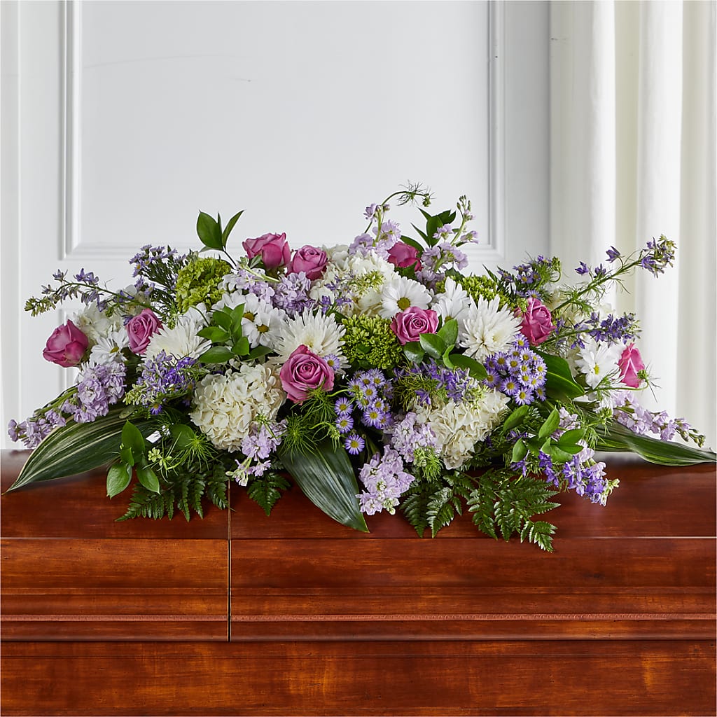Meadows of Serenity Casket Spray – Rainbow Flower Shop, Huron SD